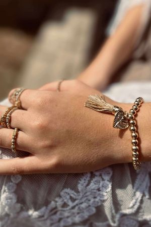 Laundry B Free Spirit Stretch Stacker Bracelet Angel Heart & Tassel Gold